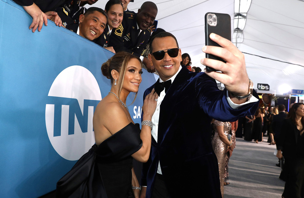 Jennifer Lopez, left, and Alex Rodriguez take a selfie as they arrive at the 26th annual Screen Actors Guild Awards at the Shrine Auditorium & Expo Hall in Los Angeles. Lopez and Rodriguez said, in a statement that reports of their split are inaccurate, and they are working things through. A day earlier, multiple reports based on anonymous sources said the couple had called off their two-year engagement
People Jennifer Lopez Alex Rodriguez, Los Angeles, United States - 19 Jan 2020