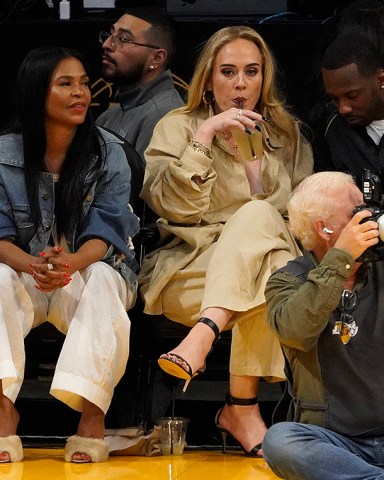 Adele along with boyfriend Rich Paul and actress Nia Long are seen at Game 3 of the NBA Playoffs between the Los Angeles Lakers and The Golden State Warriors at Crypto.com Arena in Los Angeles, Ca

Pictured: Nia Long,Adele,Rich Paul
Ref: SPL6426695 060523 NON-EXCLUSIVE
Picture by: London Entertainment / SplashNews.com

Splash News and Pictures
USA: +1 310-525-5808
London: +44 (0)20 8126 1009
Berlin: +49 175 3764 166
photodesk@splashnews.com

World Rights