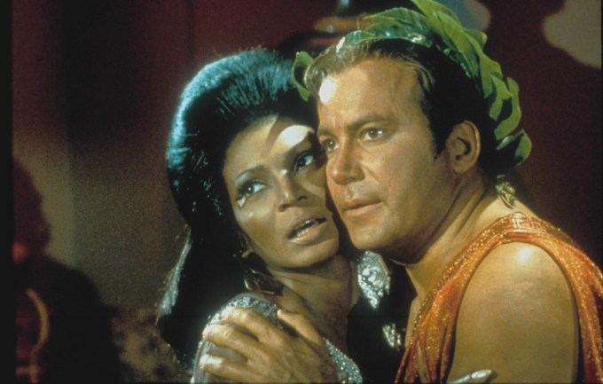 Nichelle Nichols and William Shatner get close during a scene