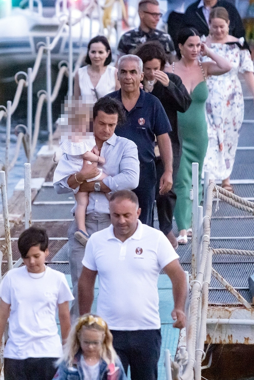 Nerano, ITALY  - *EXCLUSIVE*  American singer Katy Perry looks stunning wearing an emerald green dress while pictured with partner Orlando Bloom and their daughter Daisy Dove Bloom going out to enjoy dinner together whilst on Holiday in Nerano! **SHOT ON 08/24/22**

Pictured: Katy Perry - Orlando Bloom

BACKGRID USA 30 AUGUST 2022 

USA: +1 310 798 9111 / usasales@backgrid.com

UK: +44 208 344 2007 / uksales@backgrid.com

*UK Clients - Pictures Containing Children
Please Pixelate Face Prior To Publication*