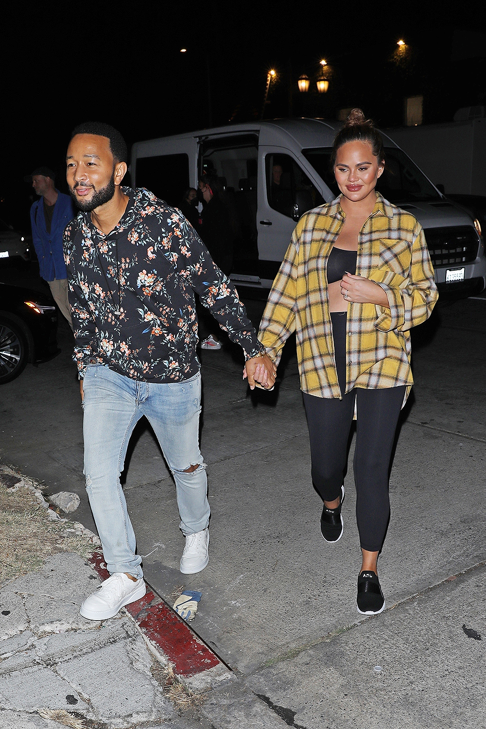 *EXCLUSIVE* Pregnant Chrissy Teigen and John Legend hold hands leaving a photoshoot in LA!