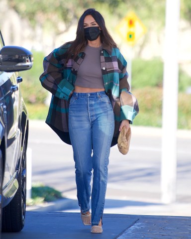 Megan Fox was spotted out in Calabasas, as she stopped for Gas. The actress showed off her fit physique in Jeans, a Crop top and an oversized plaid jacket. She wore a black face mask as she filled her own tank, before heading to a studio to work on a new project.

Pictured: Megan Fox
Ref: SPL5215362 100321 NON-EXCLUSIVE
Picture by: DIGGZY / SplashNews.com

Splash News and Pictures
USA: 310-525-5808 
UK: 020 8126 1009
eamteam@shutterstock.com

World Rights, No Portugal Rights, No Russia Rights