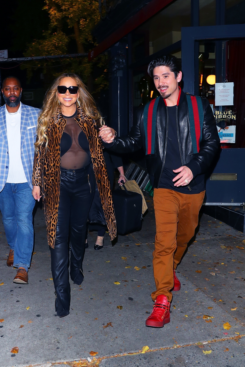 New York, NY  - *EXCLUSIVE*  - Mariah Carey & Brian Tanaka were spotted hand in hand leaving Blue Ribbon Sushi after a random and surprisingly exciting run-in with rapper Lil Durk who hung out with the couple for a while before heading to Teterboro airport. They all took greeted each other, laughed, did shots, and took personal photos before parting ways. **SHOT ON 11/07/2022**

Pictured: Mariah Carey, Brian Tanaka

BACKGRID USA 8 NOVEMBER 2022 

BYLINE MUST READ: BlayzenPhotos / BACKGRID

USA: +1 310 798 9111 / usasales@backgrid.com

UK: +44 208 344 2007 / uksales@backgrid.com

*UK Clients - Pictures Containing Children
Please Pixelate Face Prior To Publication*