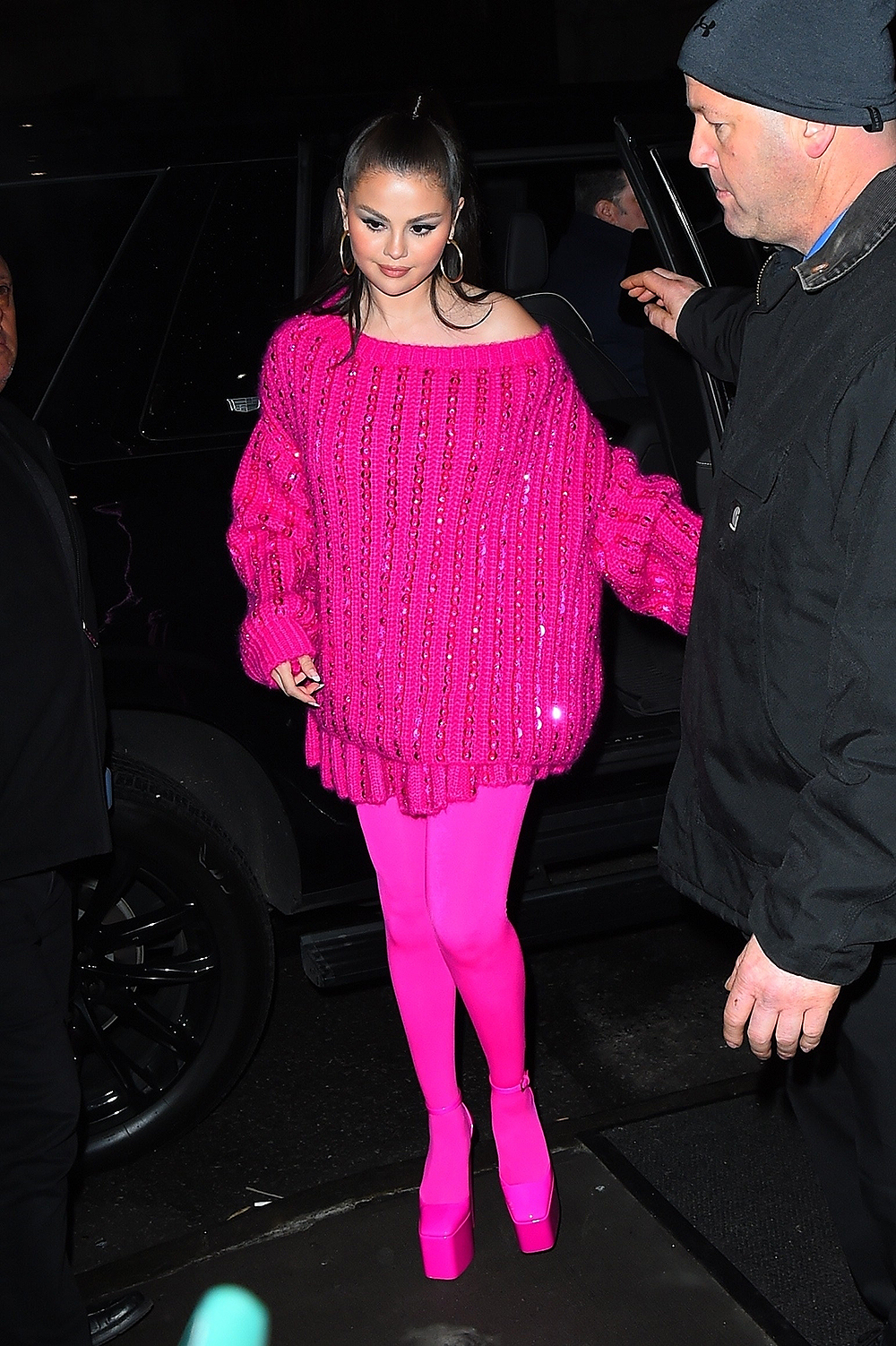 Selena Gomez is pretty in pink as she arrives at the SNL after party