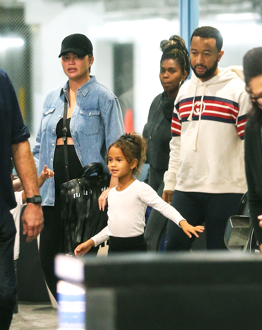 *EXCLUSIVE* Chrissy Teigen and John Legend take their kids to the movies in Los Angeles