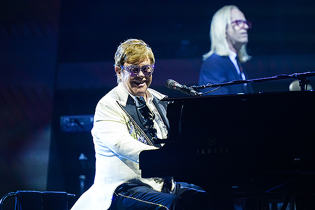 Elton John performing