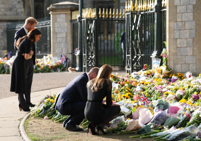 Prince and Princess of Wales along with Prince Harry and Meghan Markle the Duke and Duchess of Sussex looking at Floral Tributes and meeting well wishers at Windsor Castle