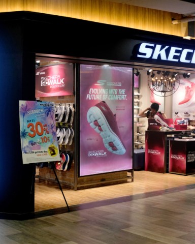 Bangkok, Thailand - April 8, 2019 : External shop facade of a Sketchers shoe outlet at MBK Center; Shutterstock ID 1393581929; purchase_order: Photo; job: Farrah