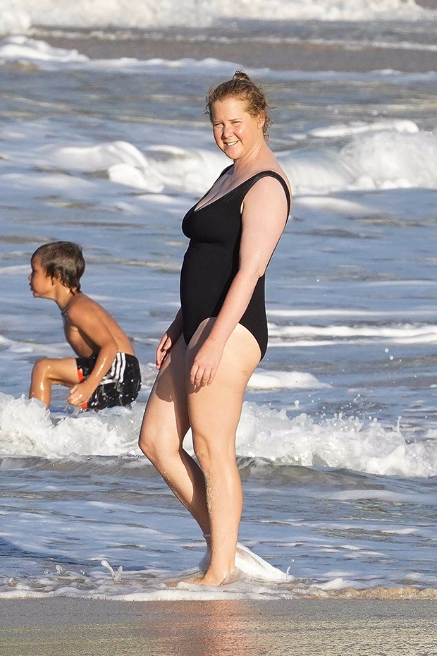 Amy Schumer black swimsuit