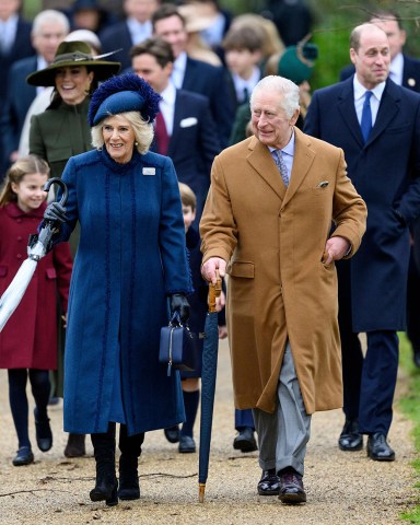 Camilla Queen Consort and King Charles III followed by Princess Charlotte, Catherine Princess of Wales, Prince Louis, Prince George and Prince William
Christmas Day church service, Sandringham, Norfolk, UK - 25 Dec 2022