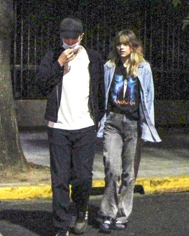 Argentina, ARGENTINA  - *EXCLUSIVE*  - Robert Pattinson went to dinner incognito with his girlfriend Suki Waterhouse and their local friend and hostess. The actor had arrived in the city 3 days ago to wait for his partner who appeared on Friday at the Lollapalooza festival. 

Both he and her friend accompanied her and were behind the scenes when the model, singer and actress gave her show at the Lollapalooza Festival. There, when she finished, she thanked the Argentine public and said "it was the best show of my life. I will never forget it, I love you”. 

Later, back in the Palermo neighborhood, they decided to go to dinner together, where they walked hand in hand. They chose to try typical local dishes and went to a neighborhood tavern. They tried not to be recognized (he never took off his cap, not even inside the restaurant). However, it was not enough to go unnoticed in front of the other diners who got up to ask him for a photo. They refused, saying that they were resting and enjoying themselves and that they did not want to be disturbed. They they got up and returned to the apartment where they are staying until she leaves for Chile ton Saturday where she will appear in the Lollapalooza edition in that country.

Pictured: Robert Pattinson, Suki Waterhouse

BACKGRID USA 18 MARCH 2023 

BYLINE MUST READ: The Grosby Group / BACKGRID

USA: +1 310 798 9111 / usasales@backgrid.com

UK: +44 208 344 2007 / uksales@backgrid.com

*UK Clients - Pictures Containing Children
Please Pixelate Face Prior To Publication*