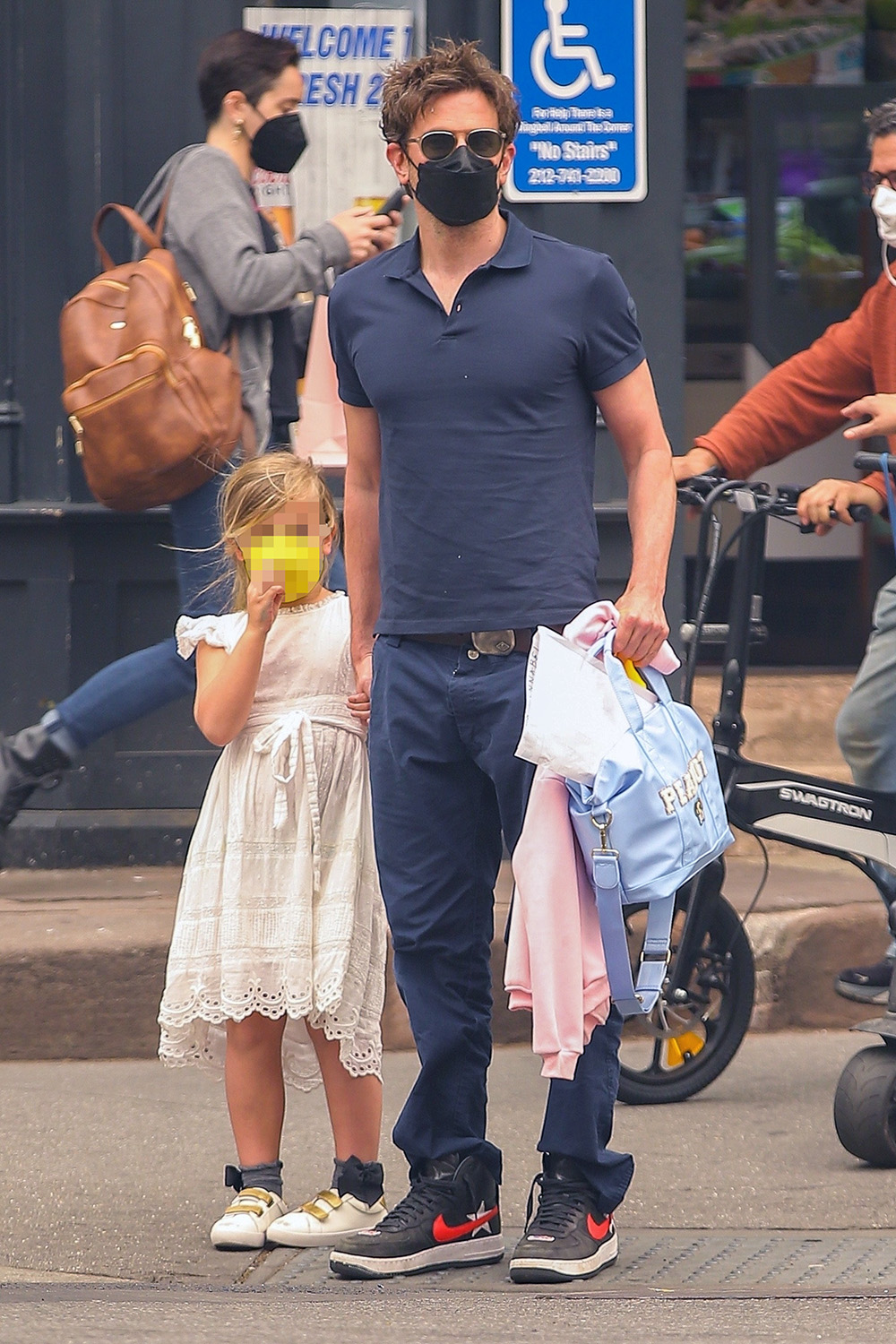 Bradley Cooper and daughter wear face masks as air quality worsens in New York