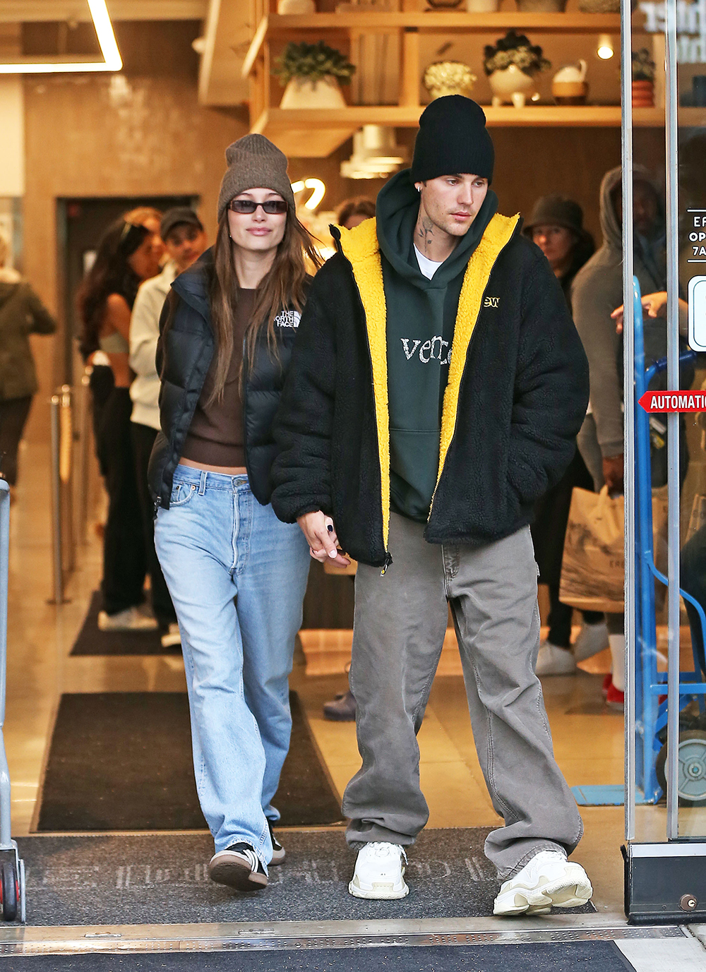 Justin Bieber and wife Hailey spotted food shopping at Erewhon on a rainy day.Pictured: Hailey Bieber,Justin BieberRef: SPL5500585 071122 NON-EXCLUSIVEPicture by: TheCelebrityFinder / SplashNews.comSplash News and PicturesUSA: +1 310-525-5808London: +44 (0)20 8126 1009Berlin: +49 175 3764 166photodesk@splashnews.comWorld Rights