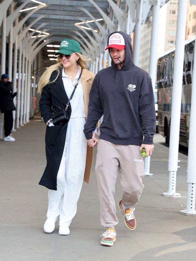 Kelsea Ballerini & Chase Stokes Holding Hands