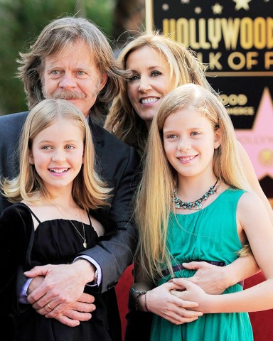 William H. Macy, Felicity Huffman Married actors William H. Macy and Felicity Huffman pose with their daughters Sophia, 11, left, and Georgia, 9, after their jointly received stars on the Hollywood Walk of Fame in Los Angeles
Walk of Fame Felicity Huffman and William H. Macy, Los Angeles, USA