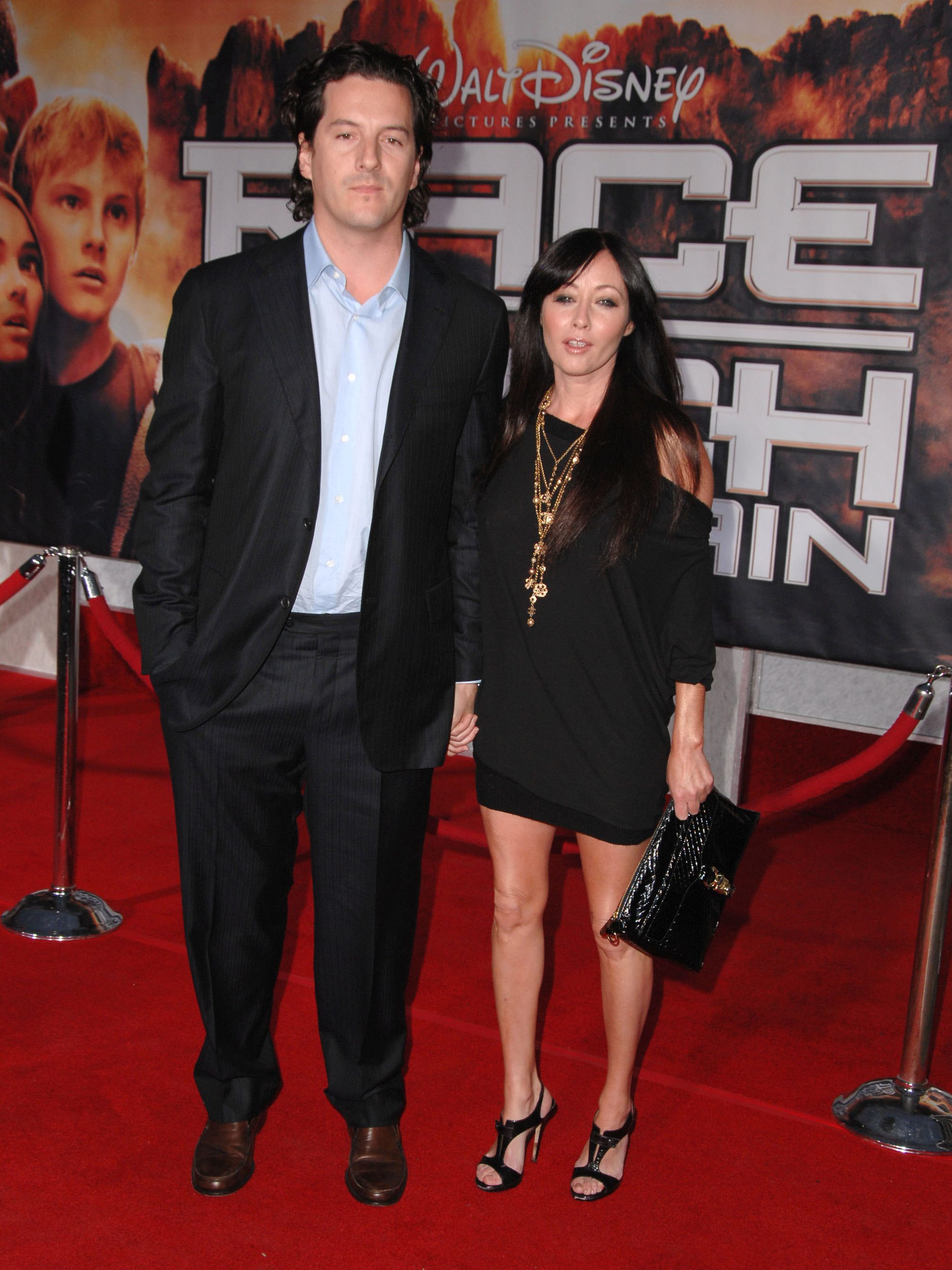HOLLYWOOD - MARCH 11: Shannen Doherty and Kurt Iswarienko  arrive at the Los Angeles premiere of "Race To Witch Mountain"  at the El Capitan Theatre on March 11, 2009 in Hollywood, California. (Photo by Steve Granitz/WireImage)