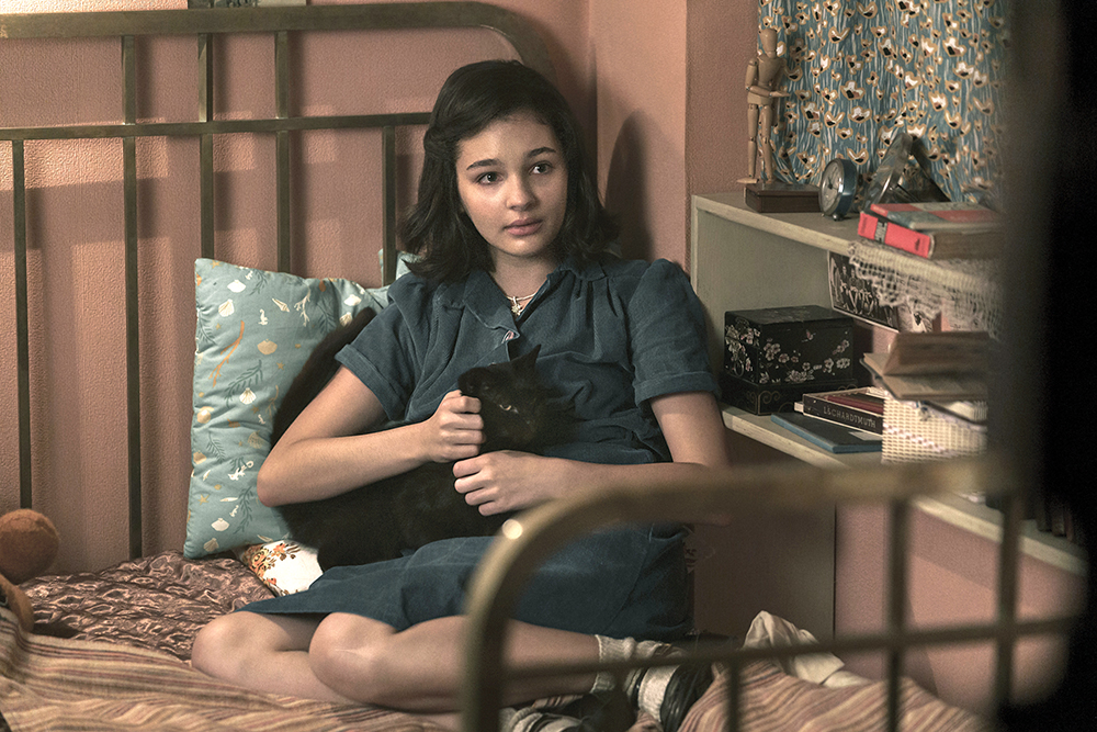 Billie Boullet as Anne Frank in A SMALL LIGHT. (Photo credit: National Geographic for Disney/Dusan Martincek)