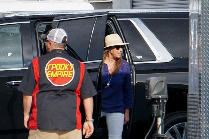 Dorothea Hurley stepping out of a vehicle