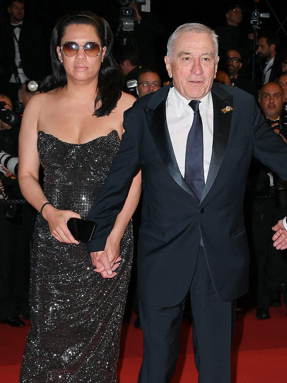 Martin Scorsese and Robert De Niro depart the "Killers Of The Flower Moon" red carpet during the 76th annual Cannes film festiva