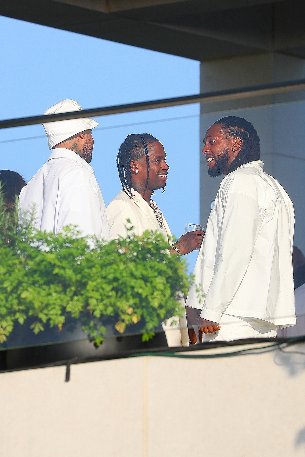 Travis Scott attends Michael Rubin's Fourth of July bash in the Hamptons