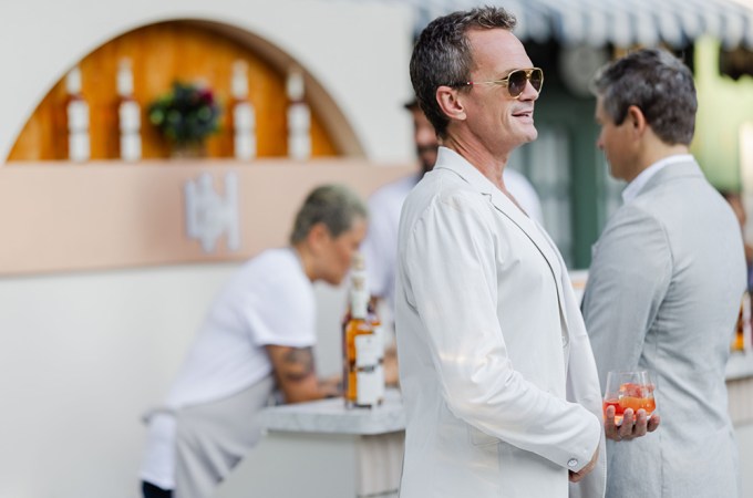 Neil Patrick Harris was spotted in his summer finest sipping Basil Hayden Bourbon aperitif cocktails