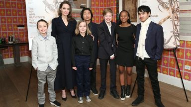 NEW YORK, NEW YORK - FEBRUARY 25: Angelina Jolie with children Knox Leon Jolie-Pitt, Vivienne Marcheline Jolie-Pitt, Pax Thien Jolie-Pitt, Shiloh Nouvel Jolie-Pitt, Zahara Marley Jolie-Pitt and Maddox Chivan Jolie-Pitt attend "The Boy Who Harnessed The Wind" Special Screening at Crosby Street Hotel on February 25, 2019 in New York City. (Photo by Monica Schipper/Getty Images for Netflix)