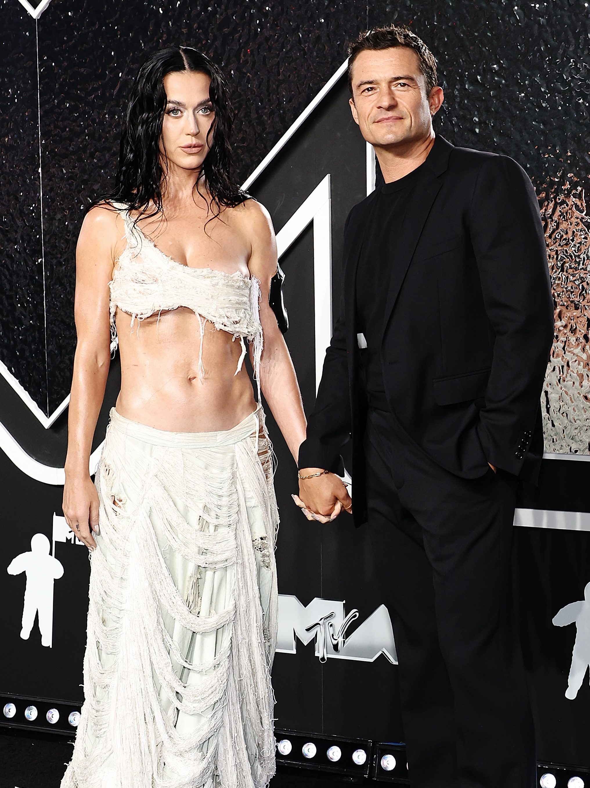 ELMONT, NEW YORK - SEPTEMBER 11: (L-R) Katy Perry and Orlando Bloom attend the 2024 MTV Video Music Awards at UBS Arena on September 11, 2024 in Elmont, New York. (Photo by Jamie McCarthy/WireImage)