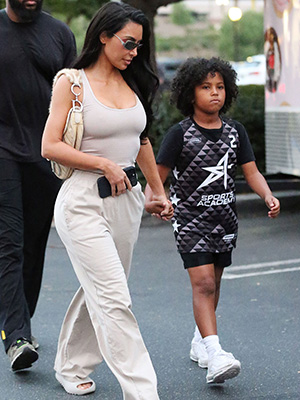 Kim Kardashian walking with her son Saint West