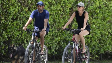 SURFSIDE, FL - JULY 14: Joaquim Valente and Gisele Bündchen are seen on a bike ride on July 14, 2024 in Surfside, Florida. (Photo by MEGA/GC Images)