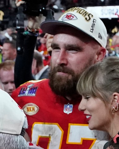 Kansas City Chiefs' tight end #87 Travis Kelce and US singer-songwriter Taylor Swift embrace as they celebrate the Chiefs winning Super Bowl LVIII against the San Francisco 49ers at Allegiant Stadium in Las Vegas, Nevada, February 11, 2024. (Photo by TIMOTHY A. CLARY / AFP) (Photo by TIMOTHY A. CLARY/AFP via Getty Images)