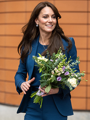 Kate Middleton carrying flowers