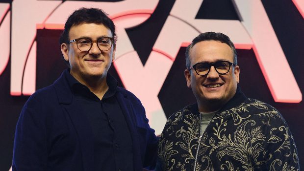 Movie directors and producers Joseph Russo (R) and his brother Anthony Russo pose for pictures during the press conference for their upcoming action thriller movie The Gray Man in Mumbai on July 21, 2022. (Photo by SUJIT JAISWAL / AFP) (Photo by SUJIT JAISWAL/AFP via Getty Images)