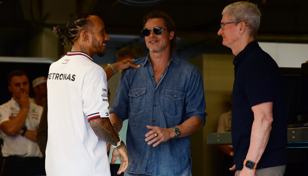 AUSTIN, TEXAS - OCTOBER 23: Lewis Hamilton of Great Britain and Mercedes meets Brad Pitt and Tim Cook in the garage prior to the F1 Grand Prix of USA at Circuit of The Americas on October 23, 2022 in Austin, Texas. (Photo by Mario Renzi - Formula 1/Formula 1 via Getty Images)