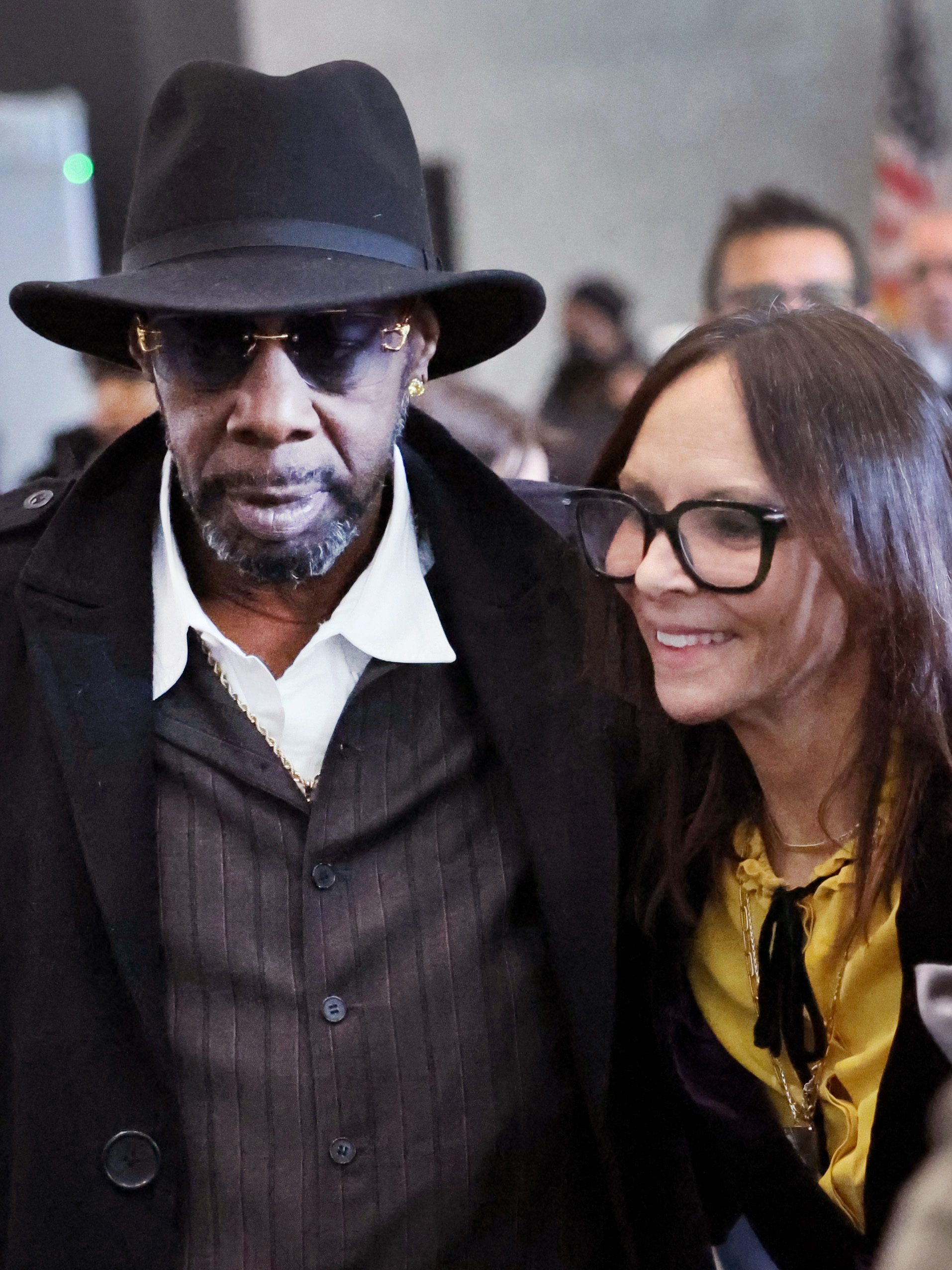 CHICAGO, ILLINOIS - FEBRUARY 23: Jennifer Bonjean (C), attorney for R&B singer R. Kelly, poses for a picture with family members including Kelly's uncle Gregory Preston (L) following his sentencing hearing at the Dirksen Federal Building on February 23, 2023 in Chicago, Illinois. Kelly, who is currently serving a 30-year sentence for racketeering and sex trafficking, was sentenced today on federal charges of child pornography and enticement of a minor for sex.  (Photo by Scott Olson/Getty Images)