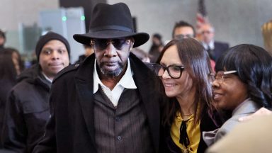 CHICAGO, ILLINOIS - FEBRUARY 23: Jennifer Bonjean (C), attorney for R&B singer R. Kelly, poses for a picture with family members including Kelly's uncle Gregory Preston (L) following his sentencing hearing at the Dirksen Federal Building on February 23, 2023 in Chicago, Illinois. Kelly, who is currently serving a 30-year sentence for racketeering and sex trafficking, was sentenced today on federal charges of child pornography and enticement of a minor for sex.  (Photo by Scott Olson/Getty Images)