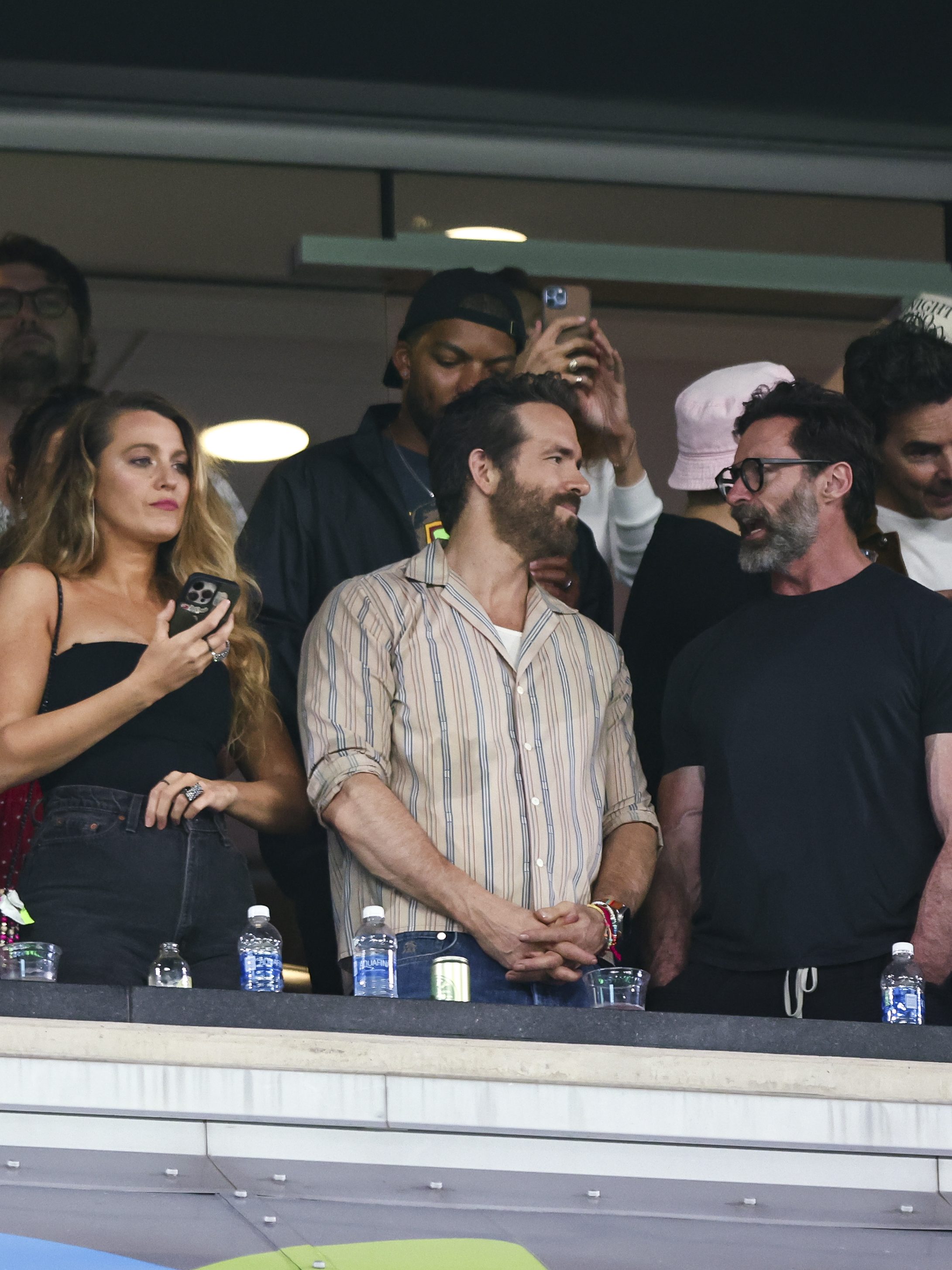 EAST RUTHERFORD, NJ - OCTOBER 1: Taylor Swift, Brittany Mahomes, Blake Lively, Hugh Jackman, and Ryan Reynolds watch from the stands during an NFL football game between the New York Jets and the Kansas City Chiefs at MetLife Stadium on October 1, 2023 in East Rutherford, New Jersey. (Photo by Kevin Sabitus/Getty Images)