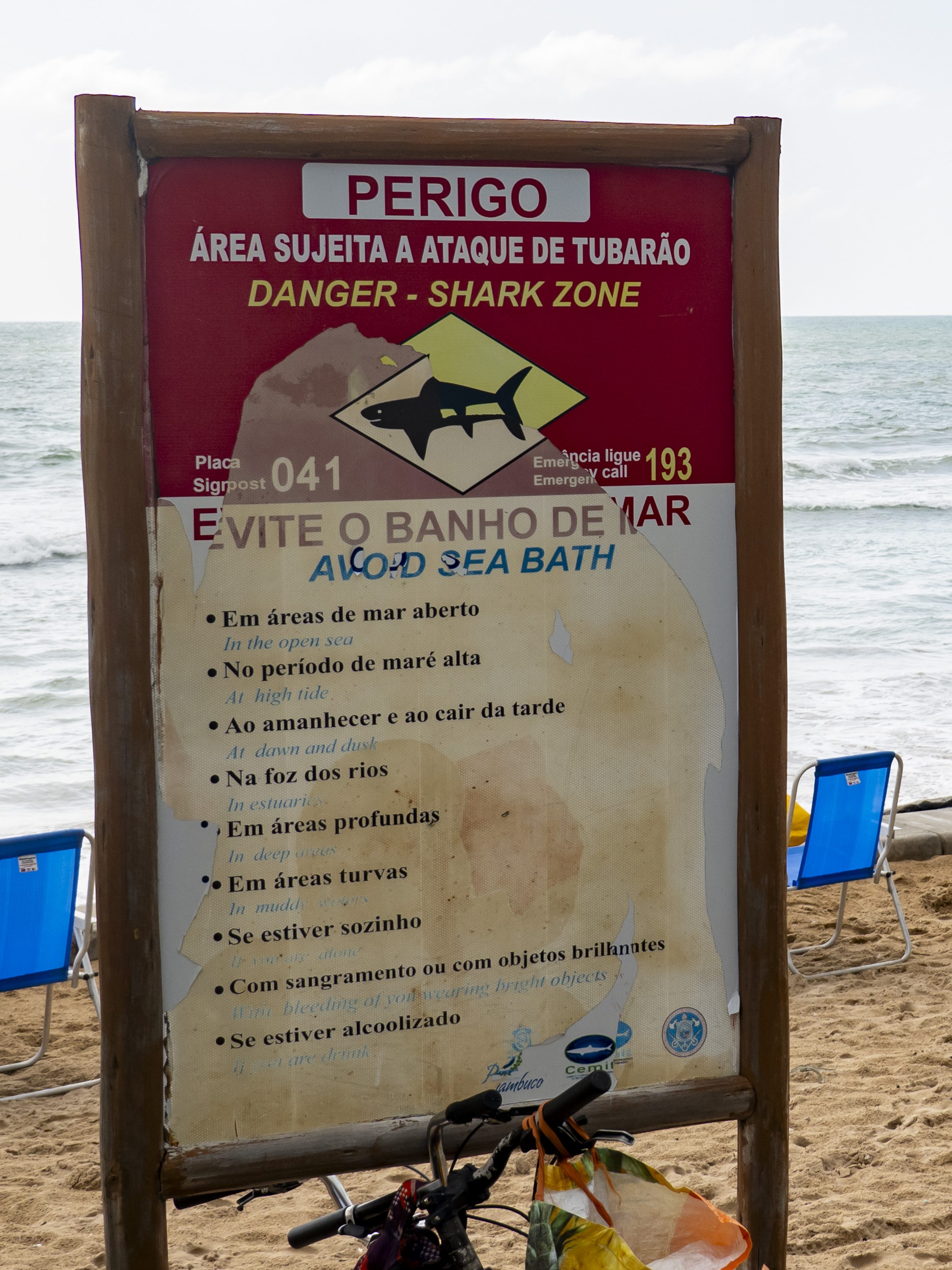 A warning sign about the danger of sharks is standing on the beach in the neighborhood of Boa Viagem, Recife, Pernambuco, Brazil, on January 27, 2024. (Photo by Emmanuele Contini/NurPhoto via Getty Images)