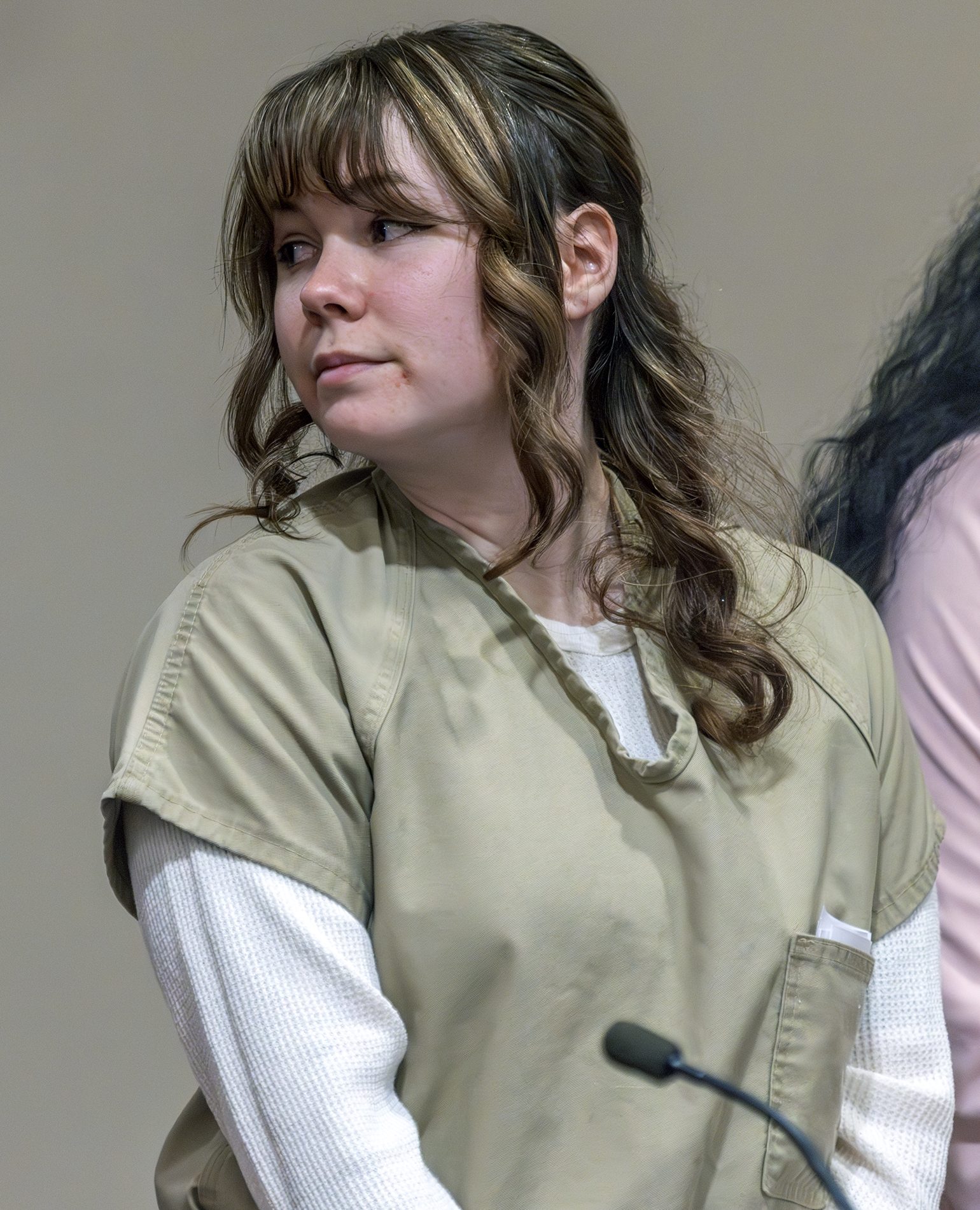 SANTA FE, NEW MEXICO - APRIL 15: Rust armorer Hannah Gutierrez-Reed looks back at her family members at her sentencing at district court on  April 15, 2024 in Santa Fe, New Mexico. Armorer on the set of the Western film "Rust,"Gutierrez Reed was convicted by a jury of involuntary manslaughter in the death of cinematographer Halyna Hutchins who was fatally shot by Alec Baldwin in 2021. Gutierrez Reed was sentenced to 18 months in prison. (Photo by Luis Sánchez Saturno-Pool/Getty Images)