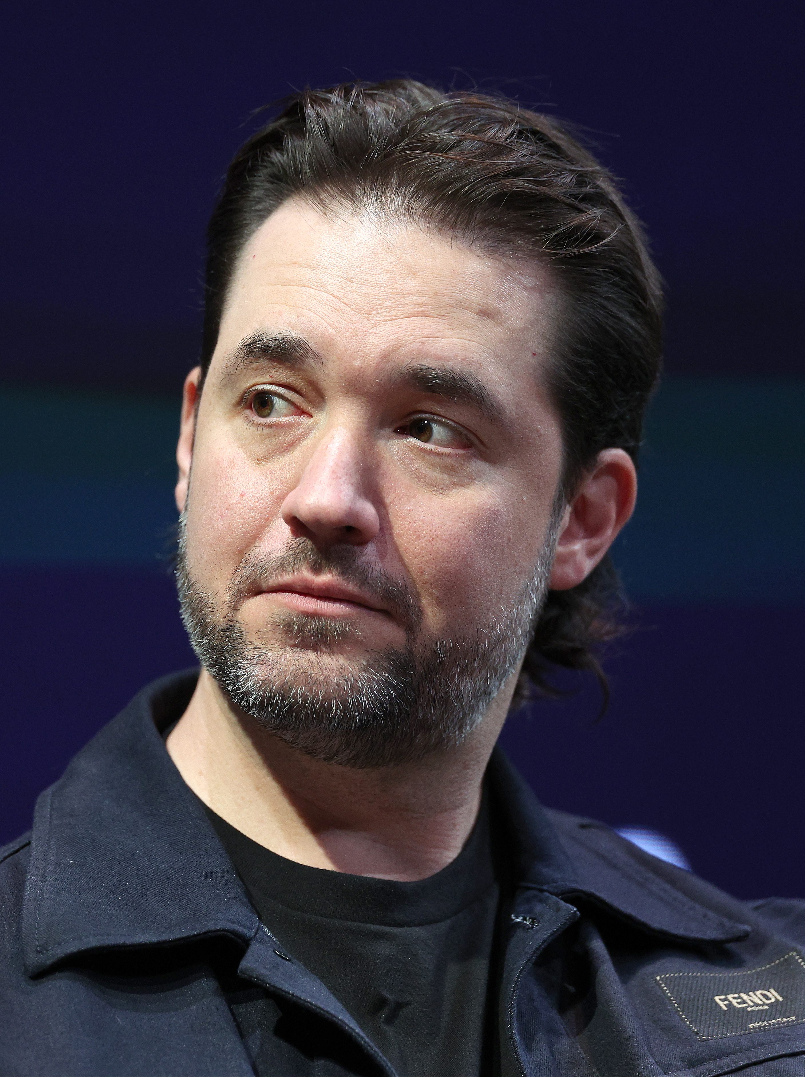 NEW YORK, NEW YORK - APRIL 23:  Alexis Ohanian, Principal Owner, Angel City Football Club & Los Angeles Golf Club, looks on during a conversation with Olympic sprinter Gabby Thomas during the Business of Women Sport Summit presented by Deep Blue Sports and Axios at Chelsea Factory on April 23, 2024 in New York City. (Photo by Elsa/Getty Images)