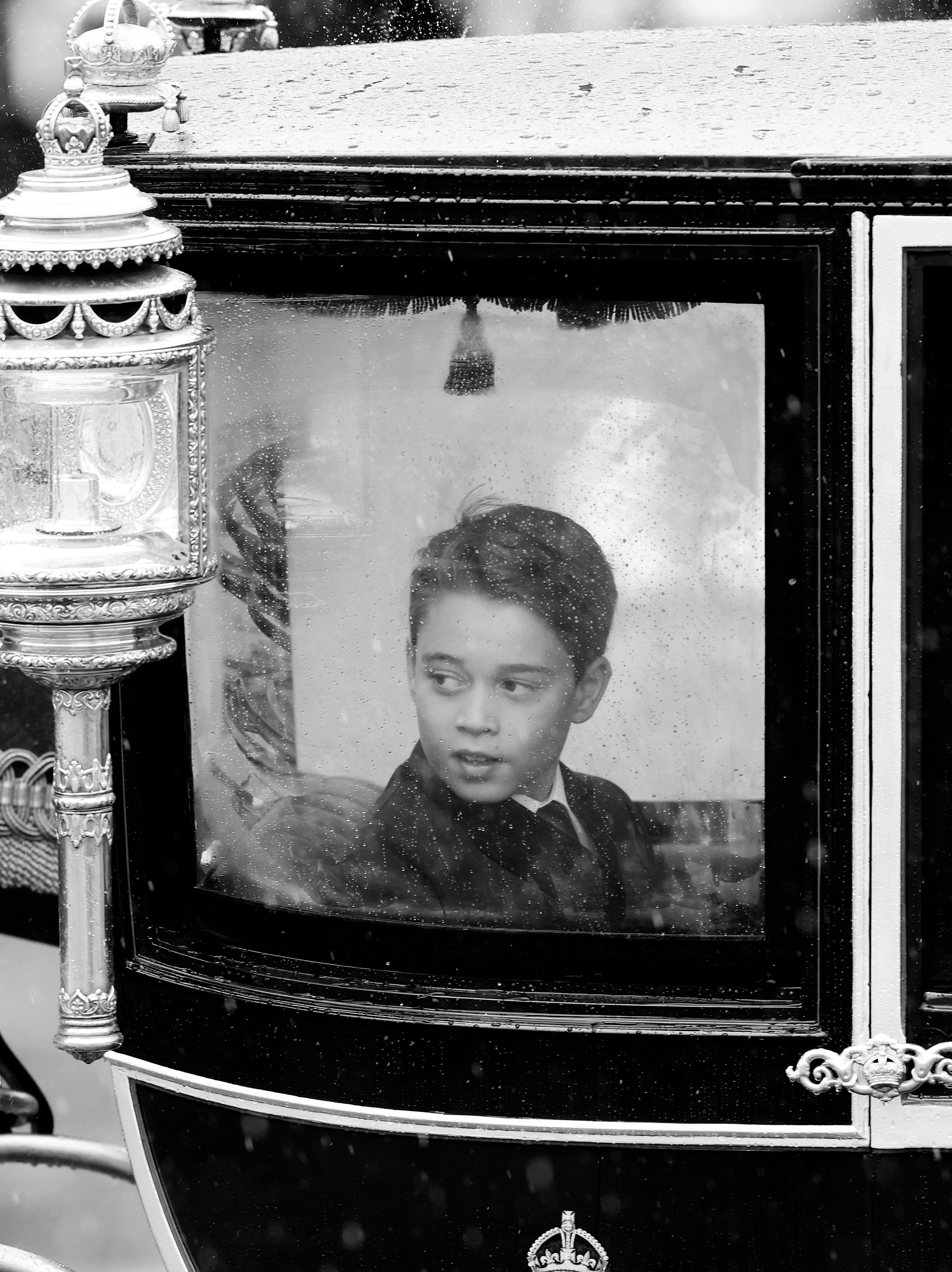 LONDON, ENGLAND - JUNE 15: (EDITOR’S NOTE: This image has been converted to black & white.) Prince George of Wales during Trooping the Colour at Buckingham Palace on June 15, 2024 in London, England. Trooping the Colour is a ceremonial parade celebrating the official birthday of the British Monarch. The event features over 1,400 soldiers and officers, accompanied by 200 horses. More than 400 musicians from ten different bands and Corps of Drums march and perform in perfect harmony. (Photo by Chris Jackson/Getty Images)