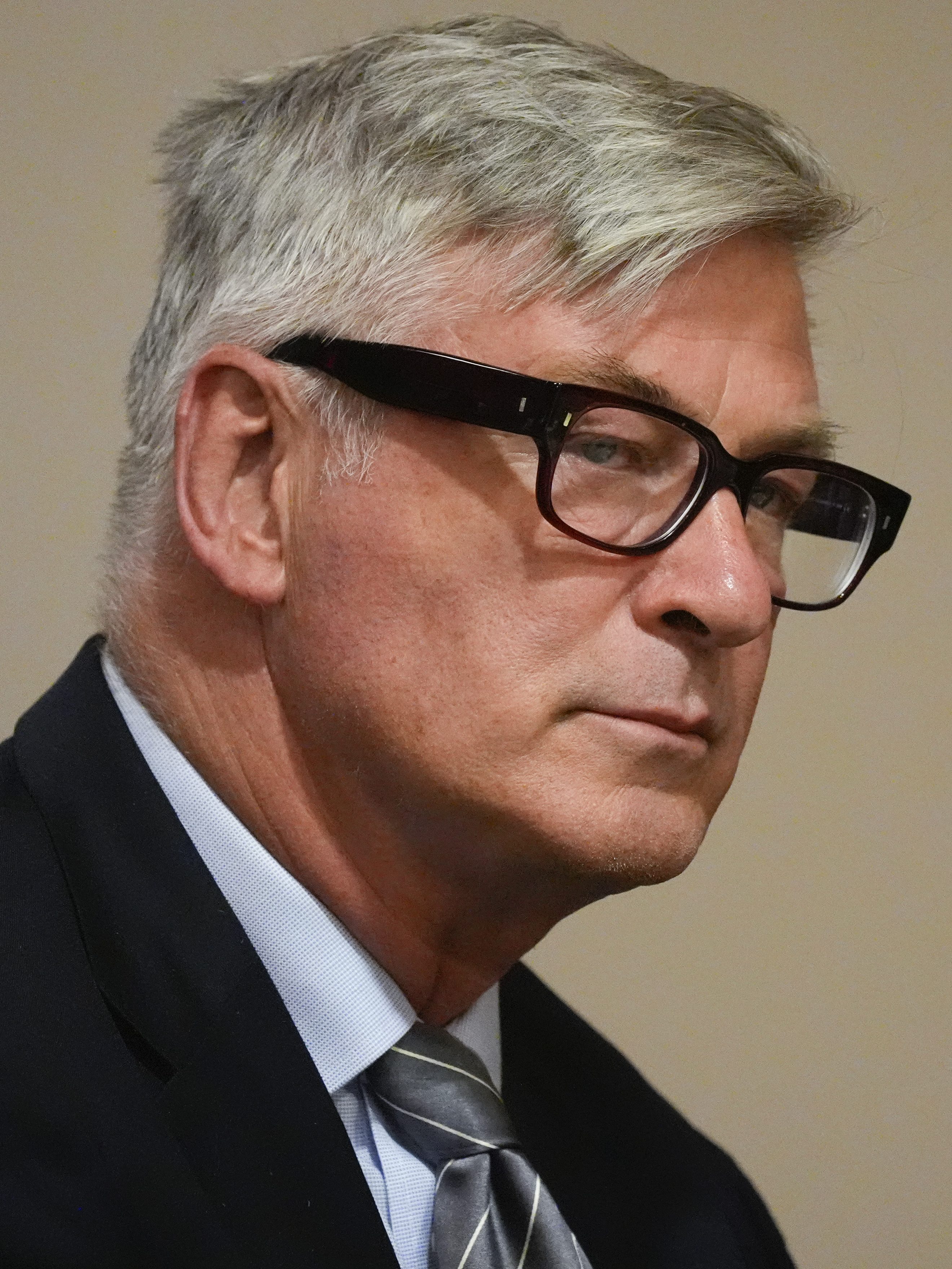 SANTA FE, NEW MEXICO - JULY 8: Alec Baldwin listens to testimony during a pretrial hearing at the First Judicial District Courthouse on July 8, 2024 in Santa Fe, New Mexico. Baldwin is facing a single charge of involuntary manslaughter in the death of cinematographer Halyna Hutchins on the set of the film "Rust". (Photo by Ross D. Franklin - Pool/Getty Images)