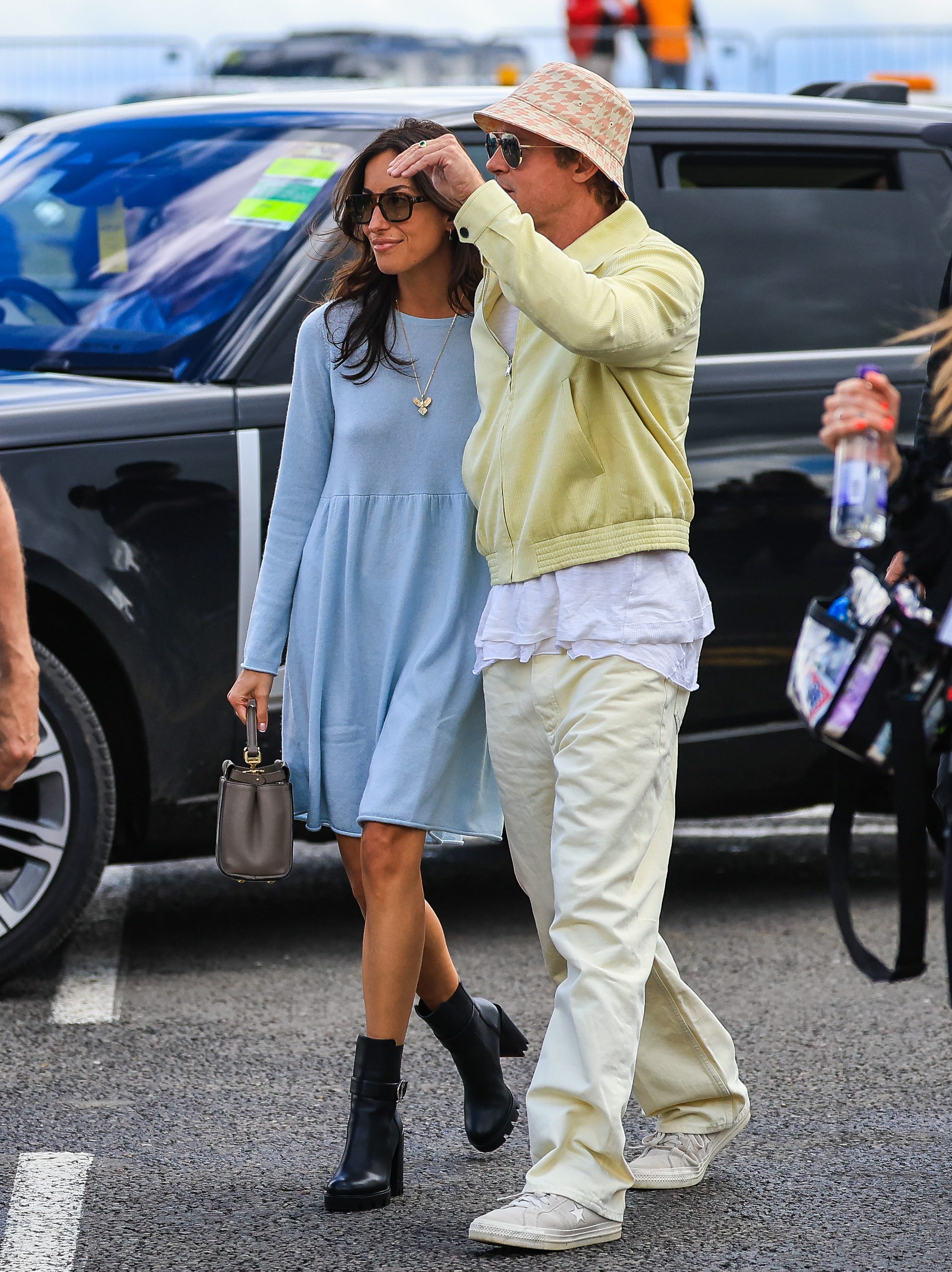 NORTHAMPTON, ENGLAND - JULY 7: Brad Pitt, star of upcoming 'F1' movie, arrives in the paddock with girlfriend Ines de Ramon during the F1 Grand Prix of Great Britain at Silverstone Circuit on July 7, 2024 in Northampton, United Kingdom. (Photo by Kym Illman/Getty Images)