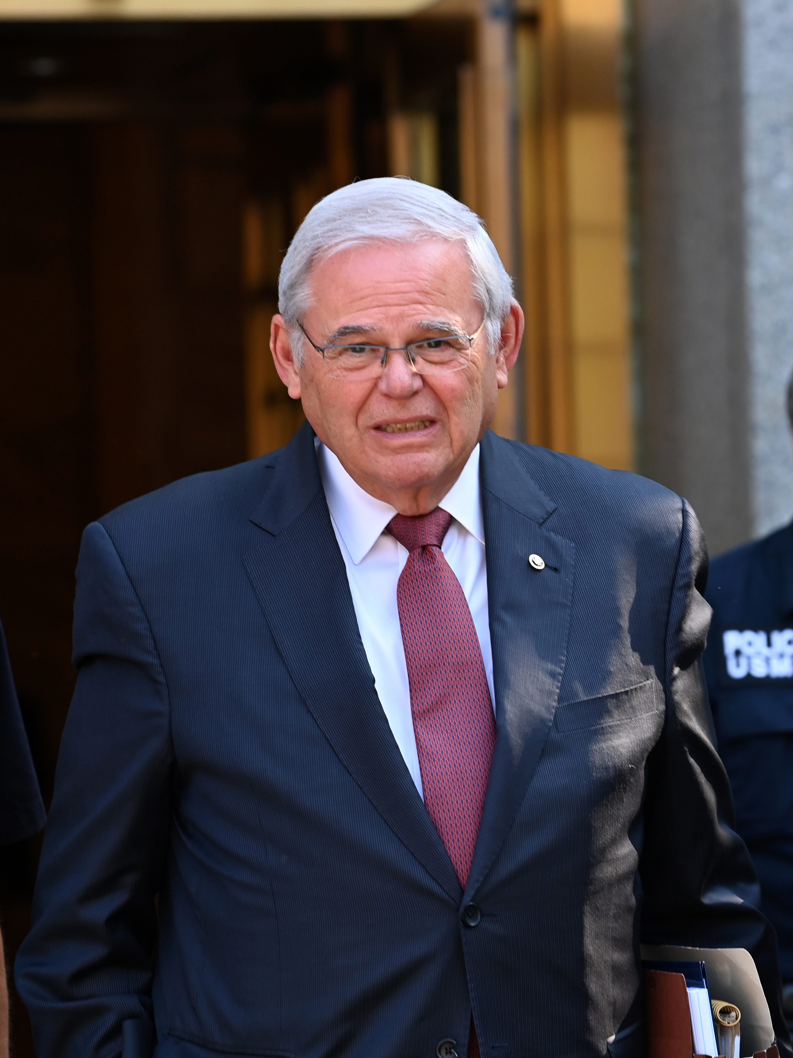 NEW YORK, NY - JULY 15: Senator Bob Menendez leaves Federal Court in lower Manhattan on the first full day of jury deliberation in his bribery trial on July 15, 2024 in New York City.  Senator Menendez is on trial for 16 felony counts including extortion and acting as a foreign agent. (Photo by Andrea Renault/Star Max/GC Images)