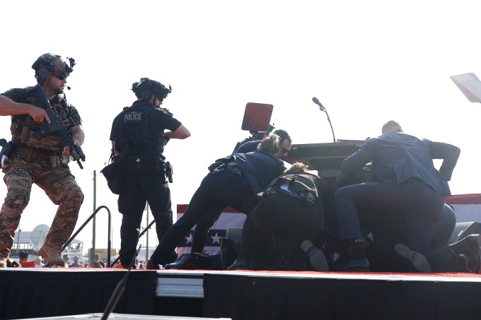 Donald Trump was rushed to the ground by Secret Service agents