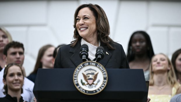 US Vice President Kamala Harris speaks during an event honoring National Collegiate Athletic Association (NCAA) championship teams from the 2023-2024 season, on the South Lawn of the White House in Washington, DC on July 22, 2024. Joe Biden on July 21, 2024 dropped out of the US presidential election and endorsed Vice President Kamala Harris as the Democratic Party's new nominee, in a stunning move that upends an already extraordinary 2024 race for the White House. Biden, 81, said he was acting in the "best interest of my party and the country" by bowing to weeks of pressure after a disastrous June debate against Donald Trump stoked worries about his age and mental fitness. (Photo by Brendan SMIALOWSKI / AFP) (Photo by BRENDAN SMIALOWSKI/AFP via Getty Images)