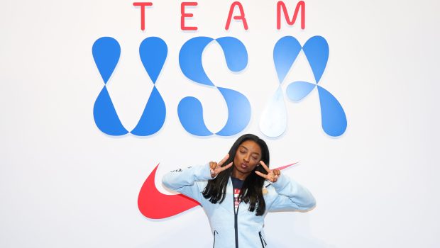 PARIS, FRANCE - JULY 22: Simone Biles tries on clothes at the Team USA Welcome Experience Ahead of Paris 2024 on July 22, 2024 in Paris, France.  (Photo by Joe Scarnici/Getty Images for USOPC)