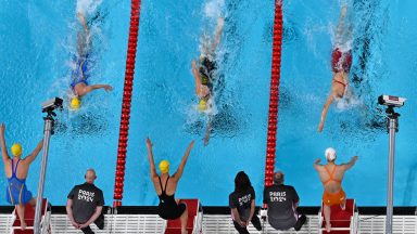 CORRECTION / An overview shows Australia's Bronte Campbell (lower C) competing in a heat of the women's 4x100m freestyle relay swimming event at the Paris 2024 Olympic Games at the Paris La Defense Arena in Nanterre, west of Paris, on July 27, 2024. (Photo by Manan VATSYAYANA / AFP) / "The erroneous mention[s] appearing in the metadata of this photo by Antonin THUILLIER has been modified in AFP systems in the following manner: Manan Vatsyayana] instead of [Antonin THUILLIER]. Please immediately remove the erroneous mention[s] from all your online services and delete it (them) from your servers. If you have been authorized by AFP to distribute it (them) to third parties, please ensure that the same actions are carried out by them. Failure to promptly comply with these instructions will entail liability on your part for any continued or post notification usage. Therefore we thank you very much for all your attention and prompt action. We are sorry for the inconvenience this notification may cause and remain at your disposal for any further information you may require." (Photo by MANAN VATSYAYANA/AFP via Getty Images)