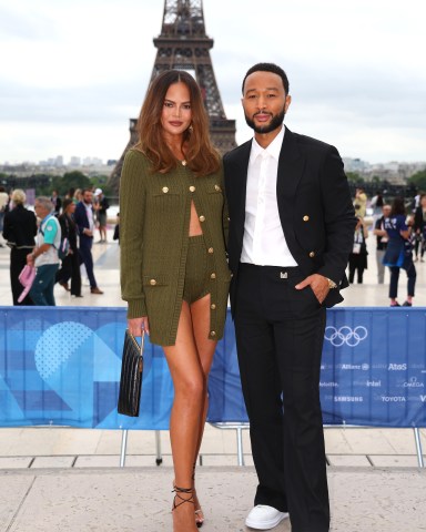 PARIS, FRANCE - JULY 26: Chrissy Teigen and John Legend attend the red carpet ahead of the opening ceremony of the Olympic Games Paris 2024 on July 26, 2024 in Paris, France. (Photo by Matthew Stockman/Getty Images)