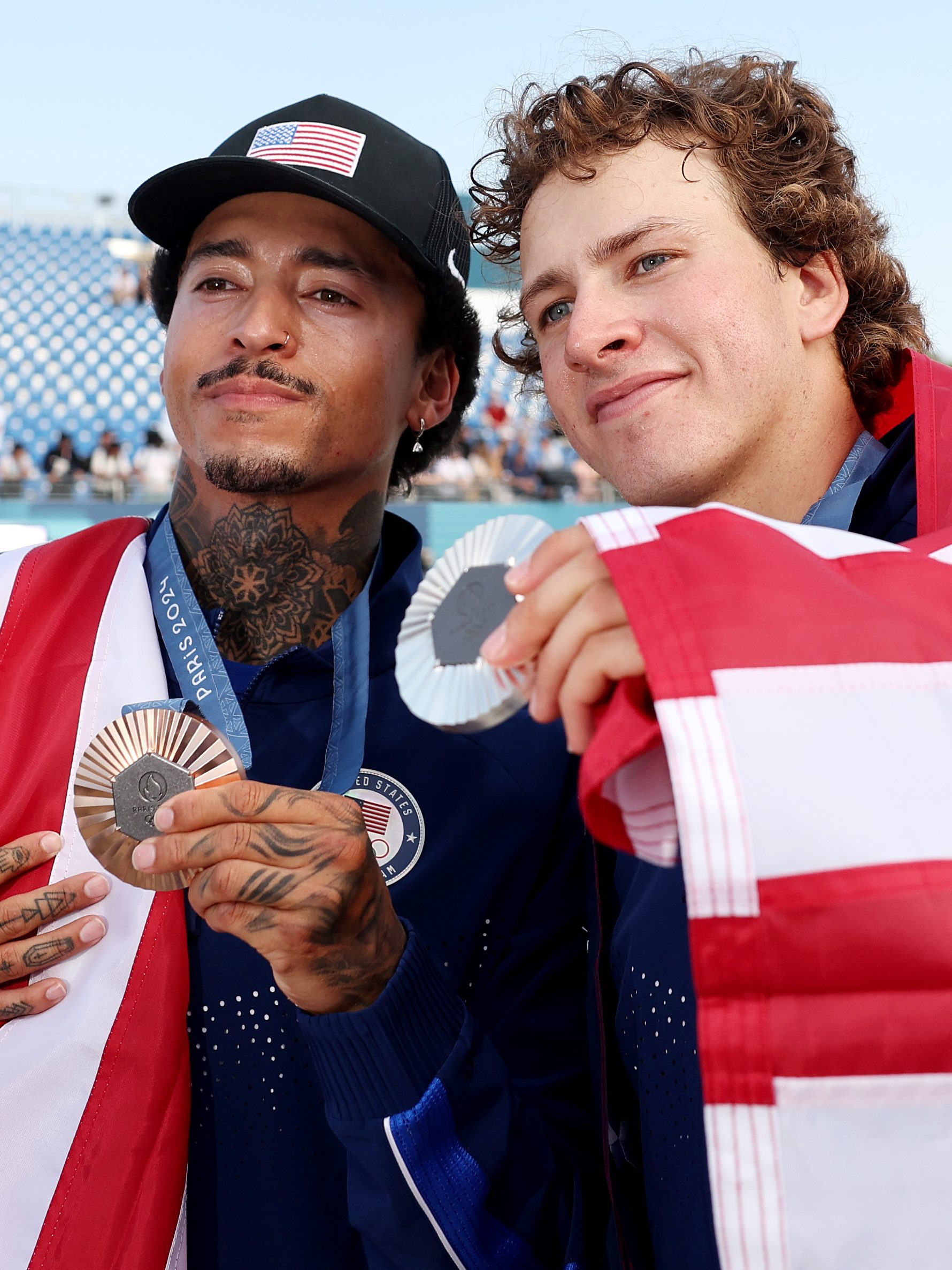PARIS, FRANCE - JULY 29: Silver medalist Jagger Eaton of Team United States (R) and Bronze medalist Nyjah Huston of Team United States (L) pose on the podium uring the Men's Street Finals on day three of the Olympic Games Paris 2024 at Place de la Concorde on July 29, 2024 in Paris, France. (Photo by Cameron Spencer/Getty Images)