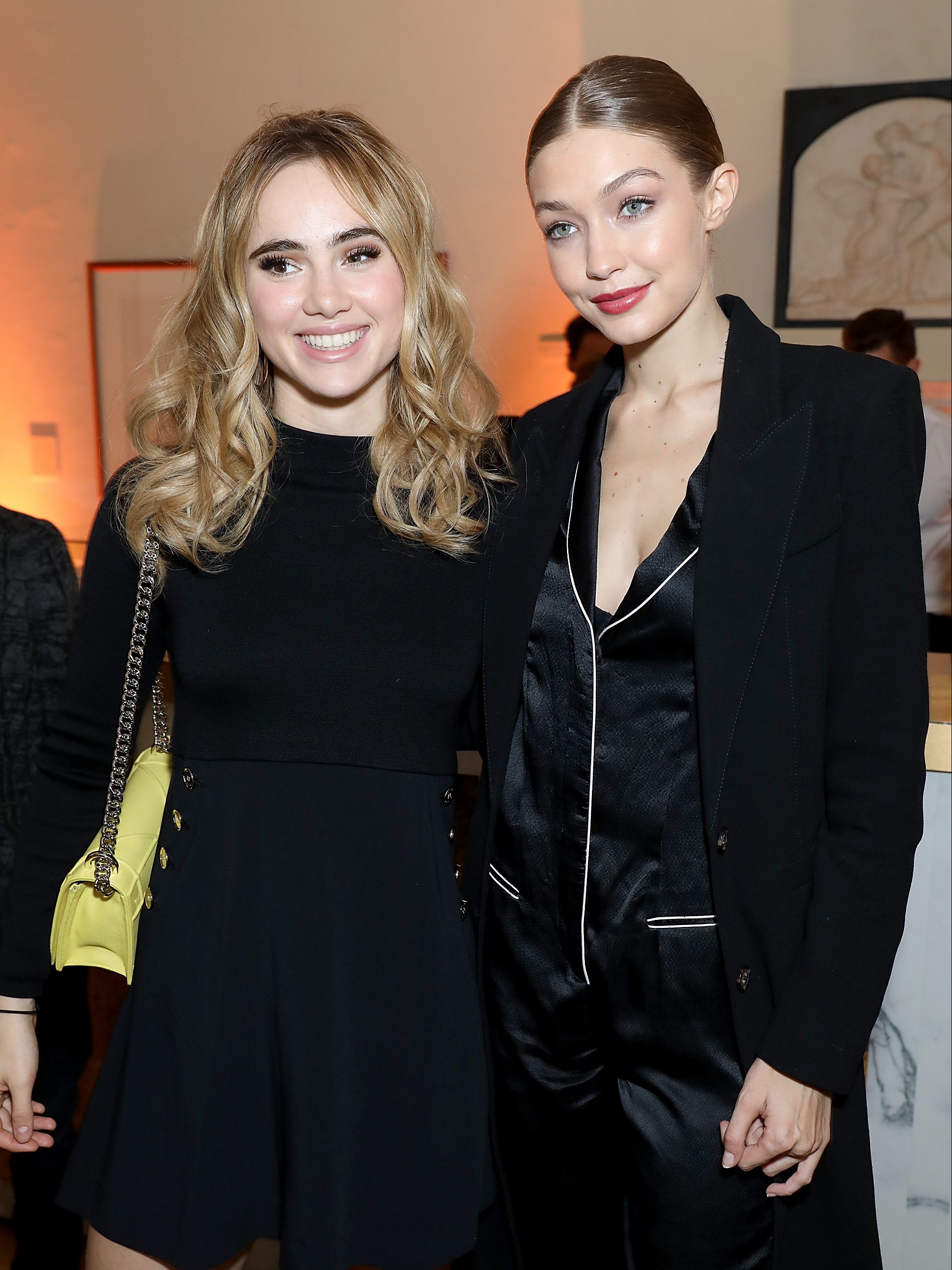 LONDON, ENGLAND - NOVEMBER 14:  Suki Waterhouse and Gigi Hadid attend a private dinner hosted by Stuart Weitzman and Gigi Hadid, to celebrate the opening of the Stuart Weitzman London Flagship Store, at the Royal Academy of Arts on November 14, 2016 in London, England.  (Photo by Darren Gerrish/Darren Gerrish/WireImage)